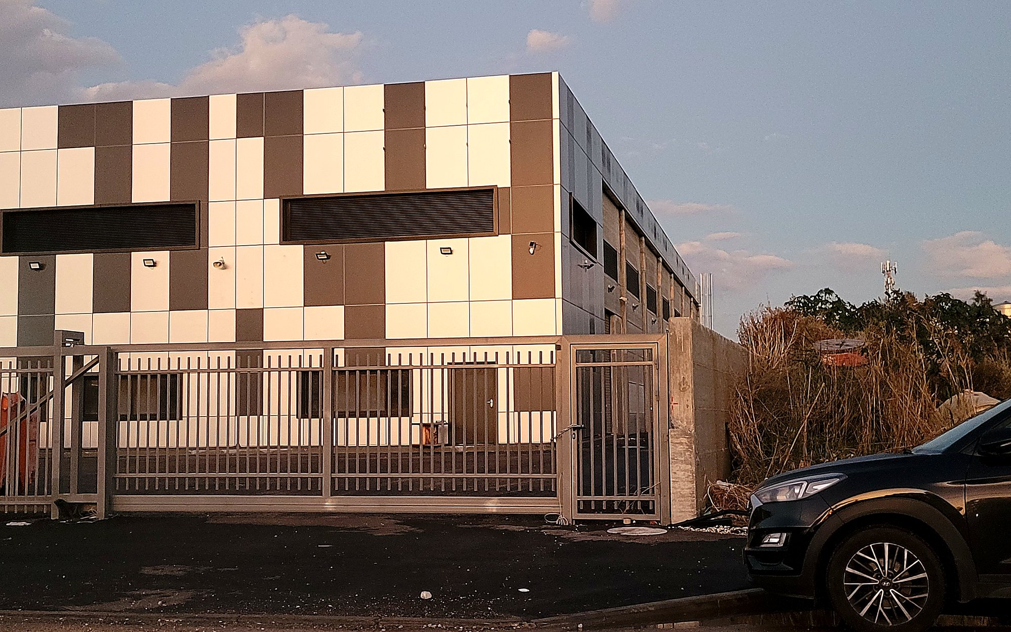 Checkerboard-Facade Building at dusk